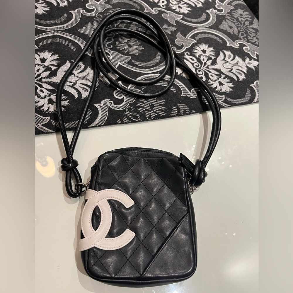 “Mini” authentic and immaculate CHANEL shoulder or crossbody. 7.5”W x 9.8”H
